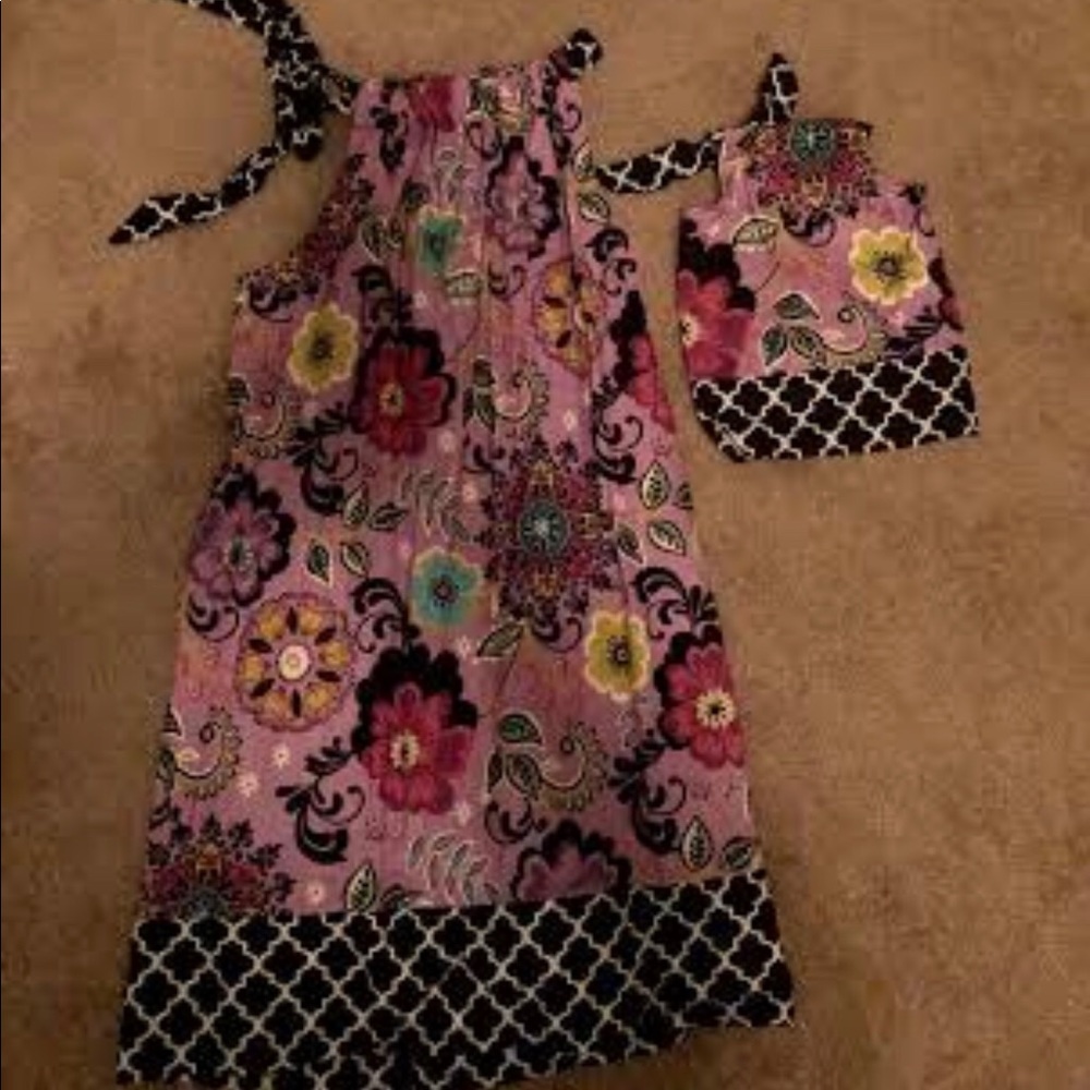 Girls dress with matching doll dress.